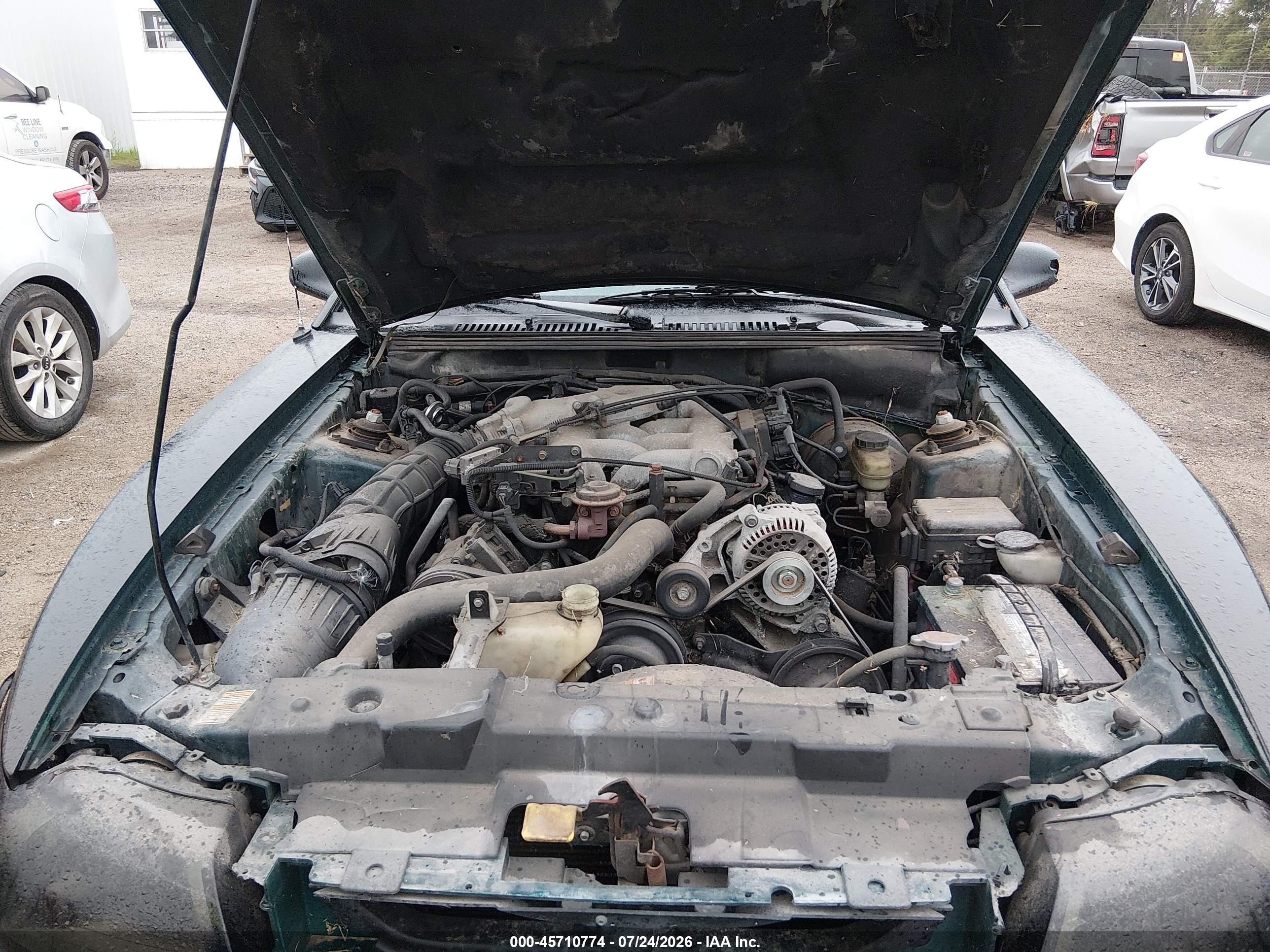 1999 Ford Mustang   Green vin: 1FAFP404XXF143048