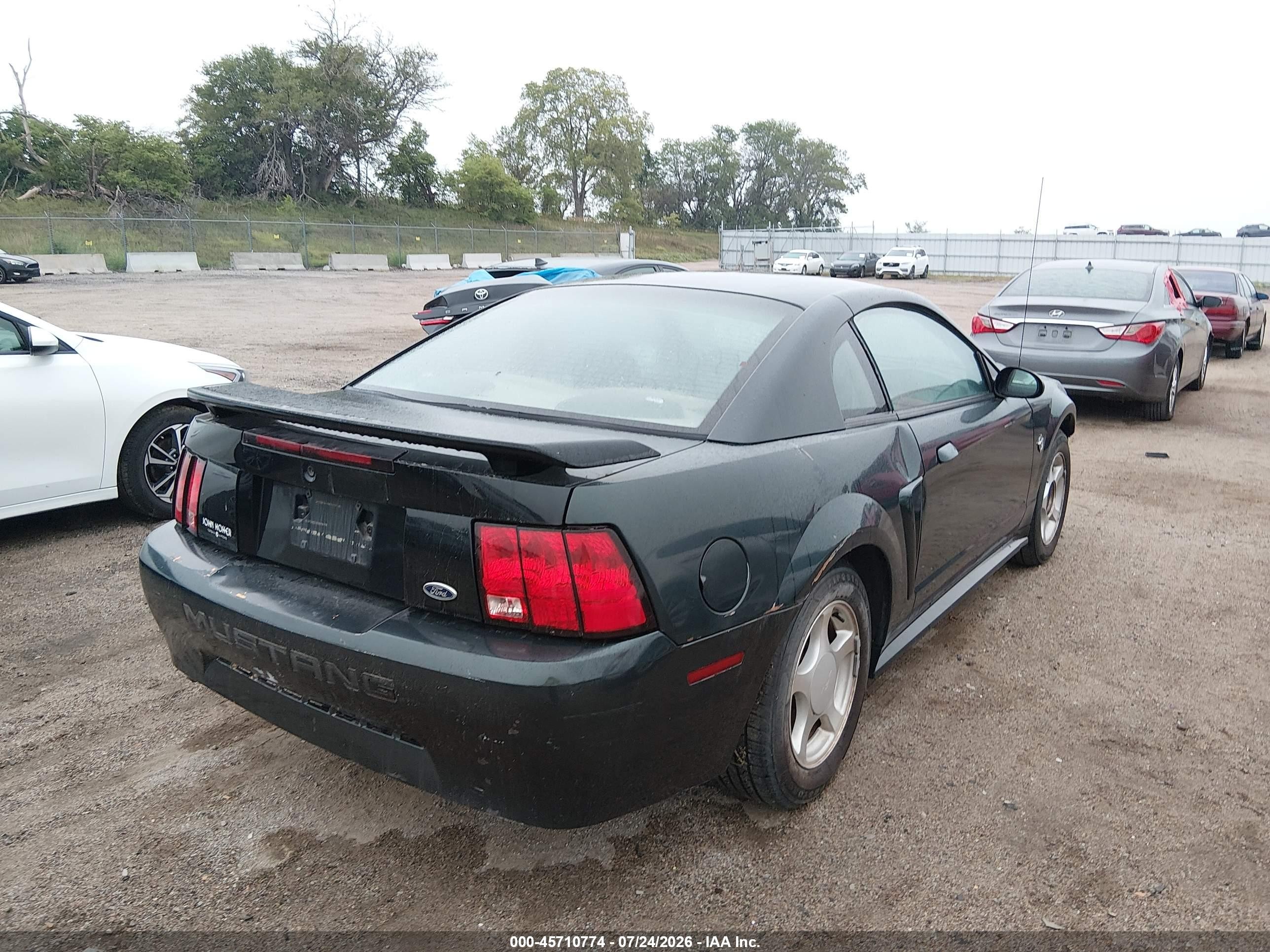 1999 Ford Mustang   Green vin: 1FAFP404XXF143048