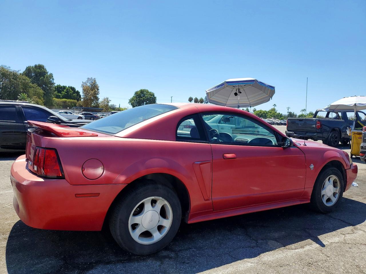 1999 Ford Mustang Red vin: 1FAFP404XXF228892
