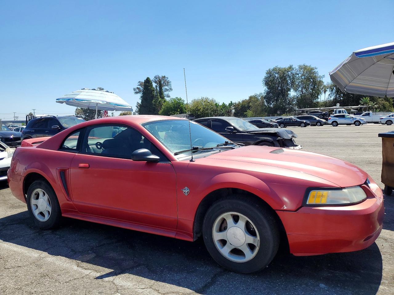 1999 Ford Mustang Red vin: 1FAFP404XXF228892