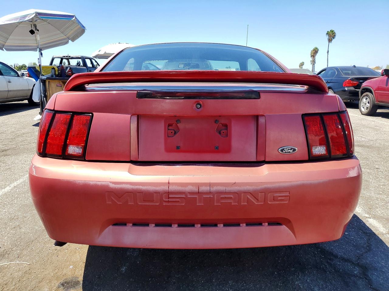 1999 Ford Mustang Red vin: 1FAFP404XXF228892