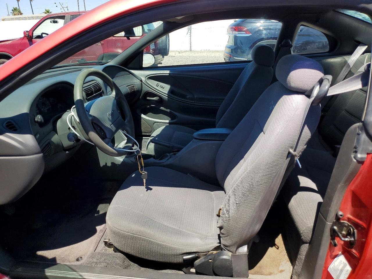 1999 Ford Mustang Red vin: 1FAFP404XXF228892