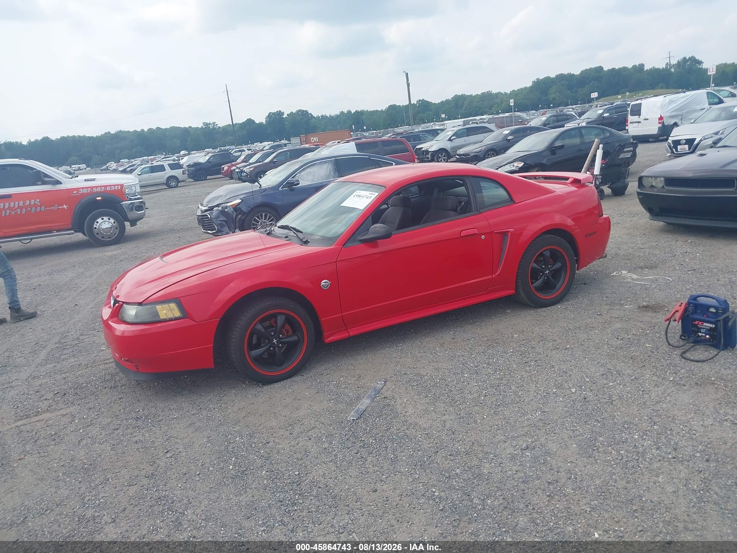 2004 Ford Mustang   Красный vin: 1FAFP40604F242071