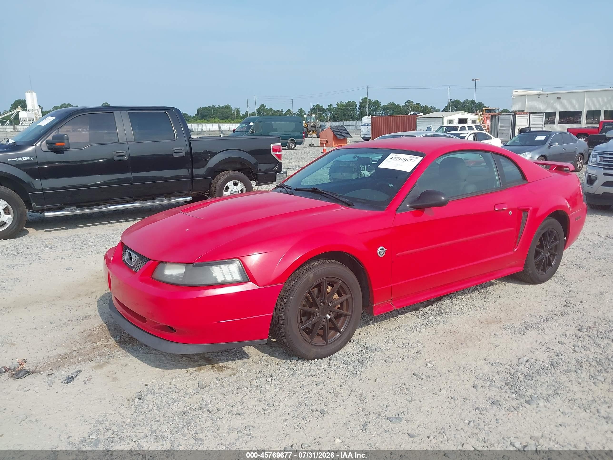 2004 Ford Mustang   Red vin: 1FAFP40624F146281