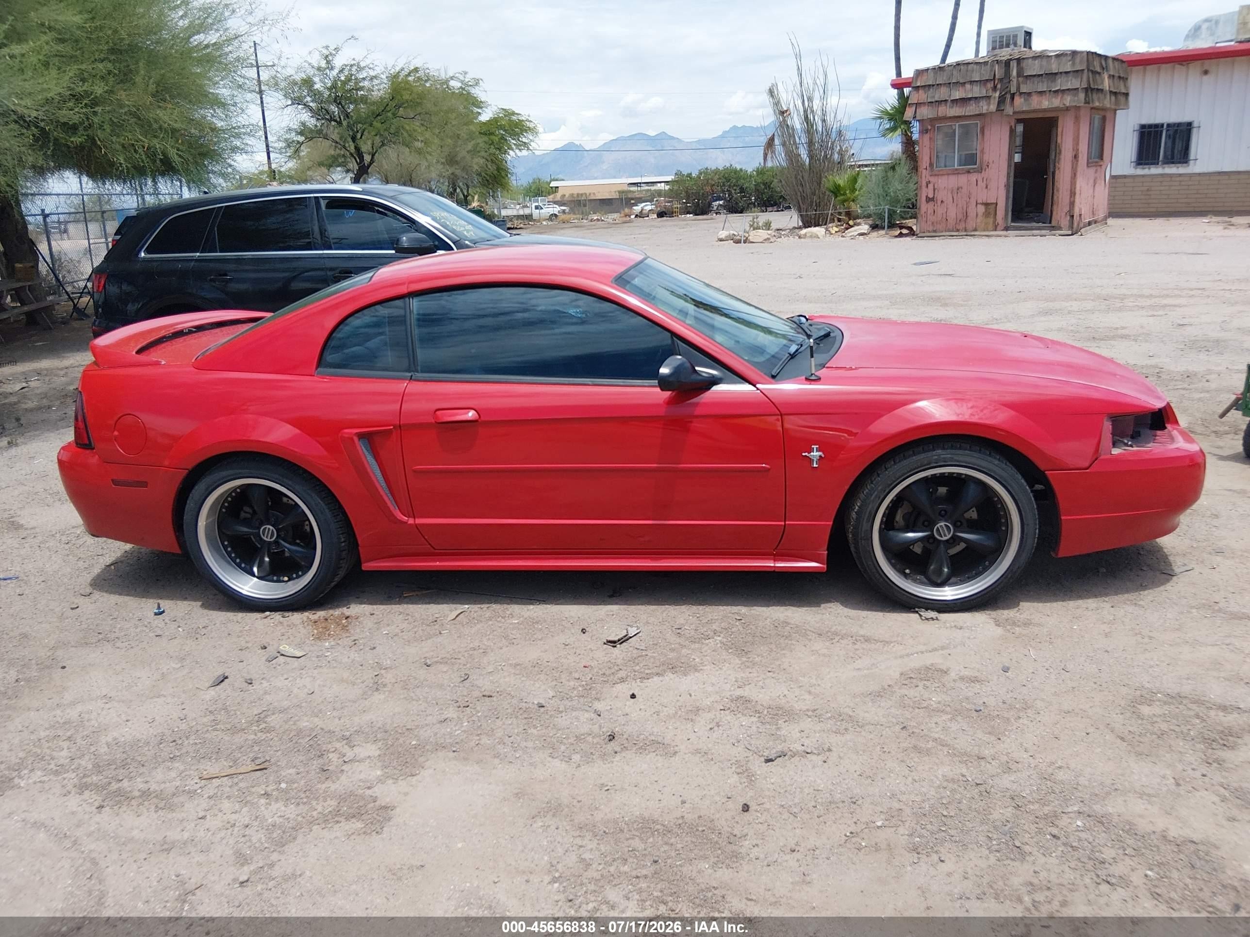 2004 Ford Mustang   Red vin: 1FAFP40634F154308