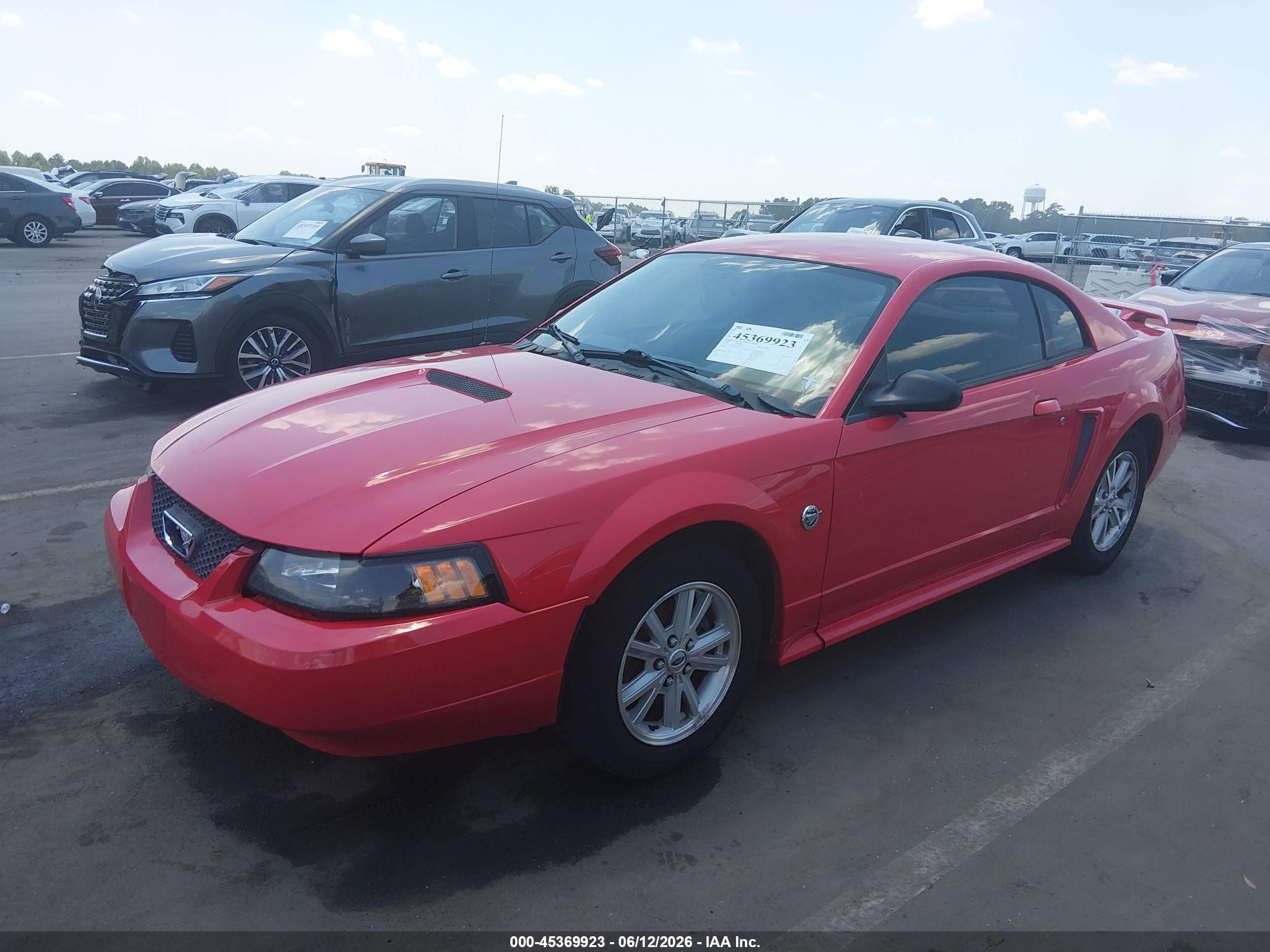 2004 Ford Mustang   Red vin: 1FAFP40694F184476
