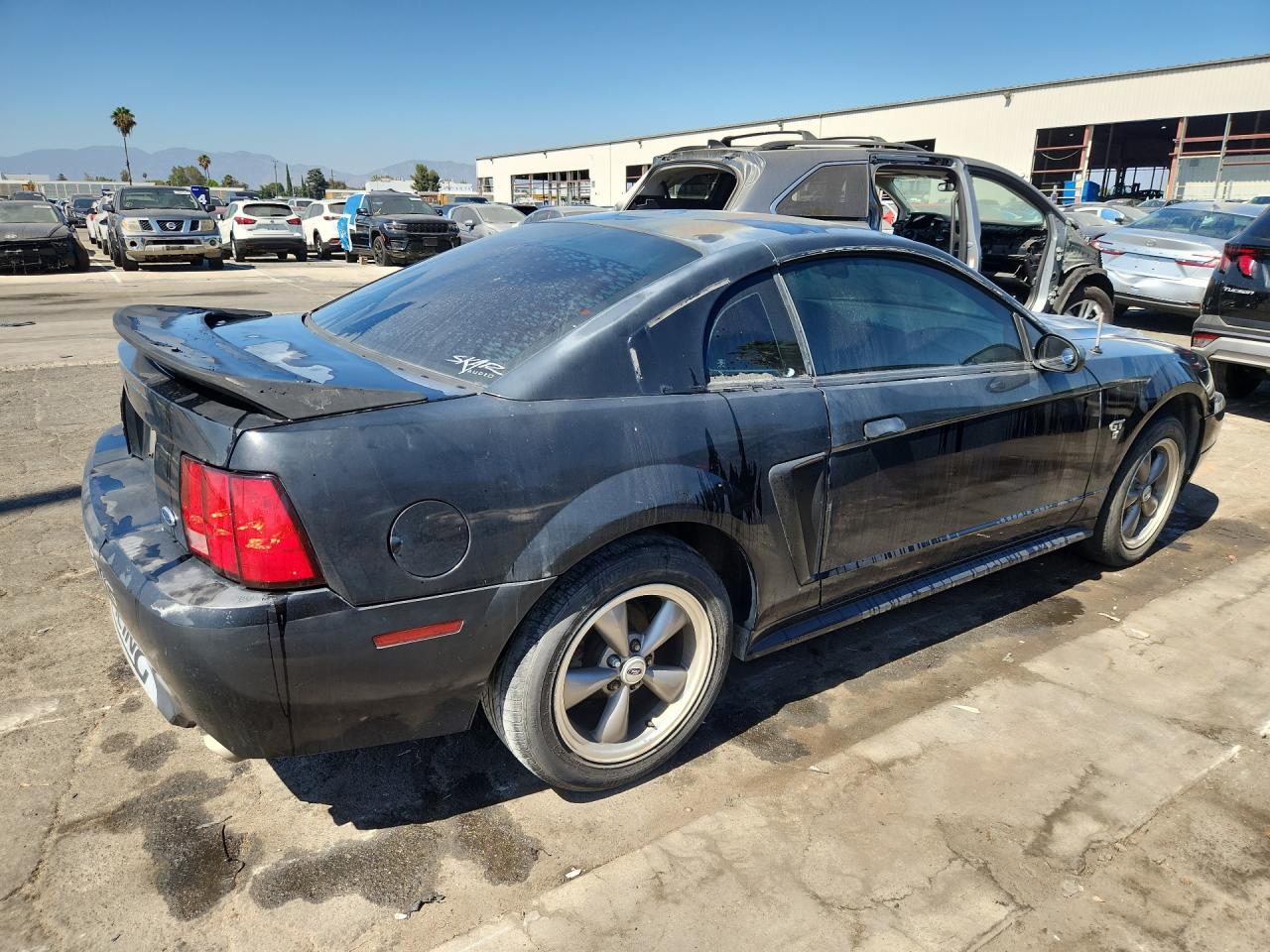 2000 Ford Mustang Gt Black vin: 1FAFP42X8YF193780 Damage: Right Qtr Panel, Oxidized, > 12 Inches