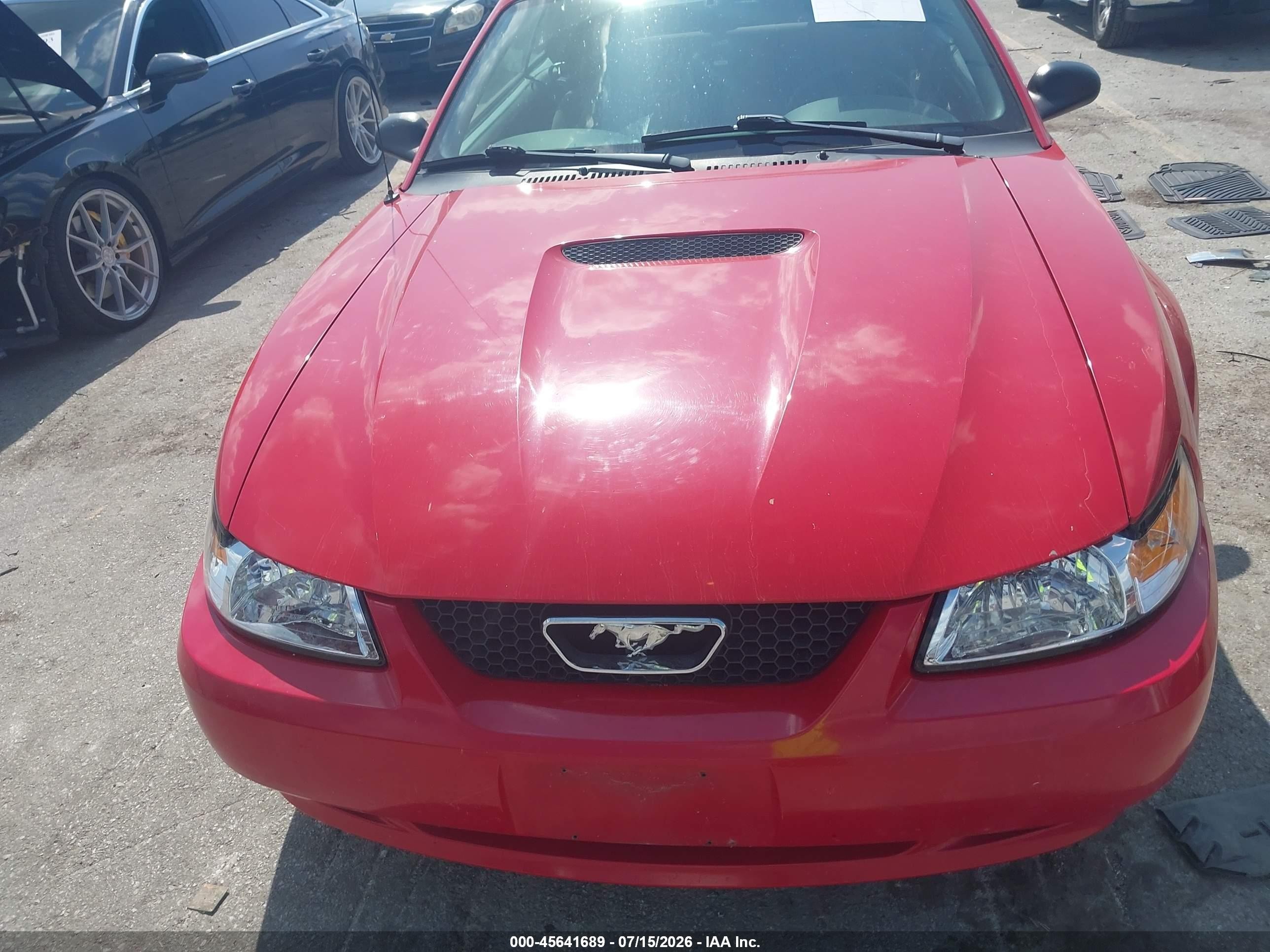 1999 Ford Mustang   Red vin: 1FAFP4442XF235491