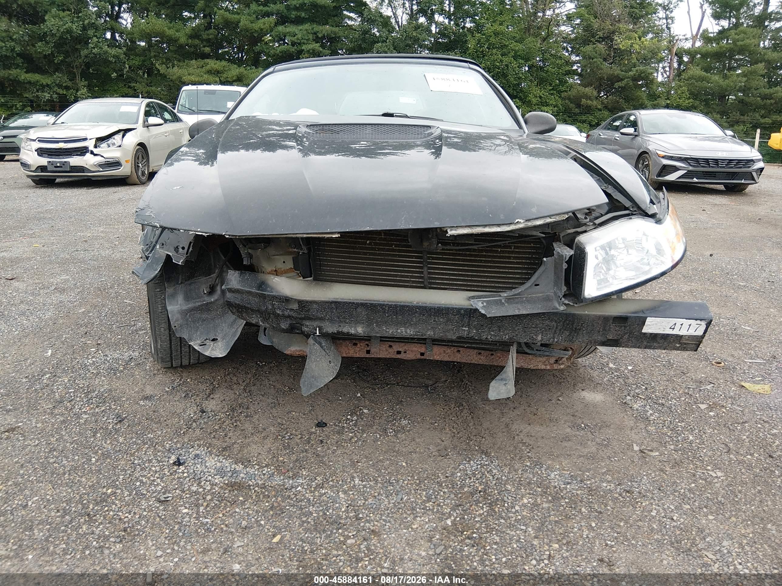 2000 Ford Mustang   Черный vin: 1FAFP4443YF215266