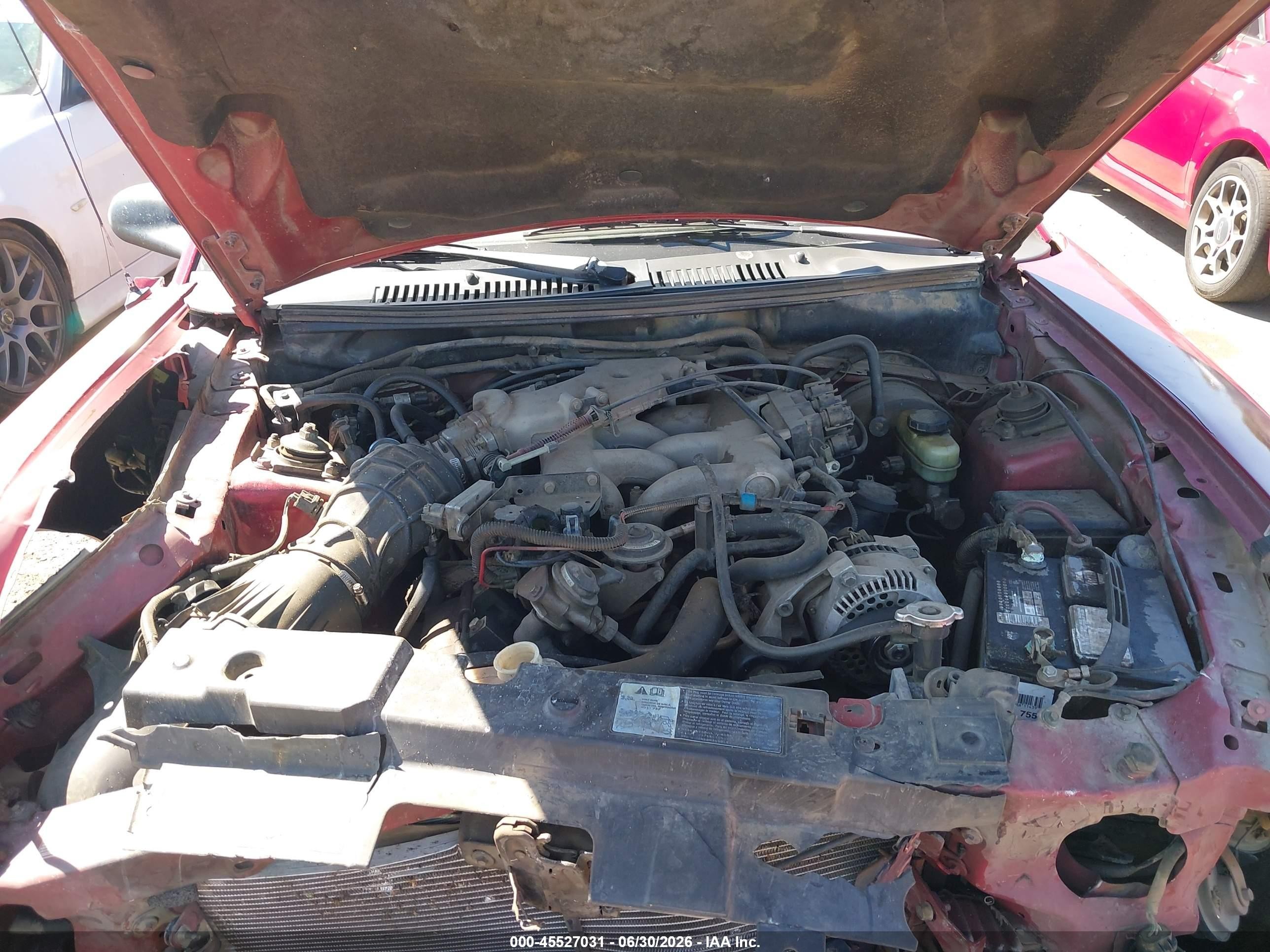 1999 Ford Mustang   Red vin: 1FAFP4449XF219336