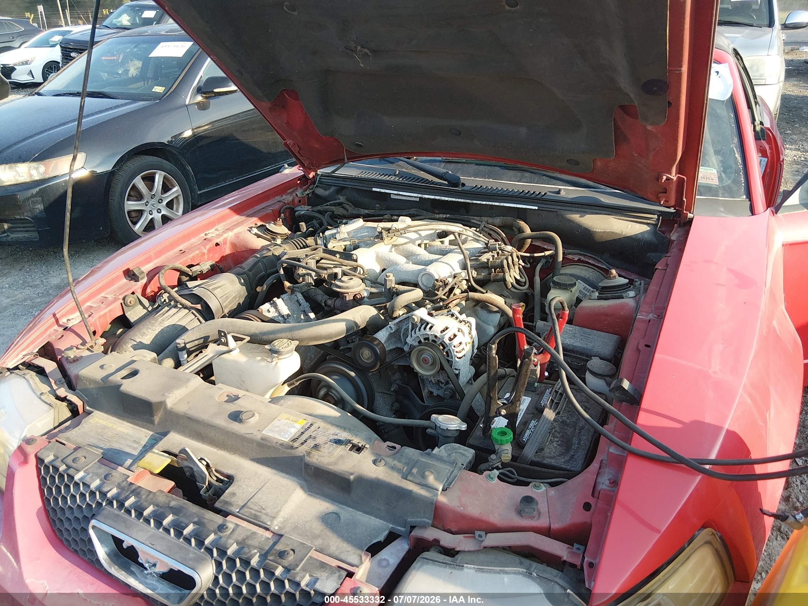 2004 Ford Mustang   Red vin: 1FAFP44654F217791