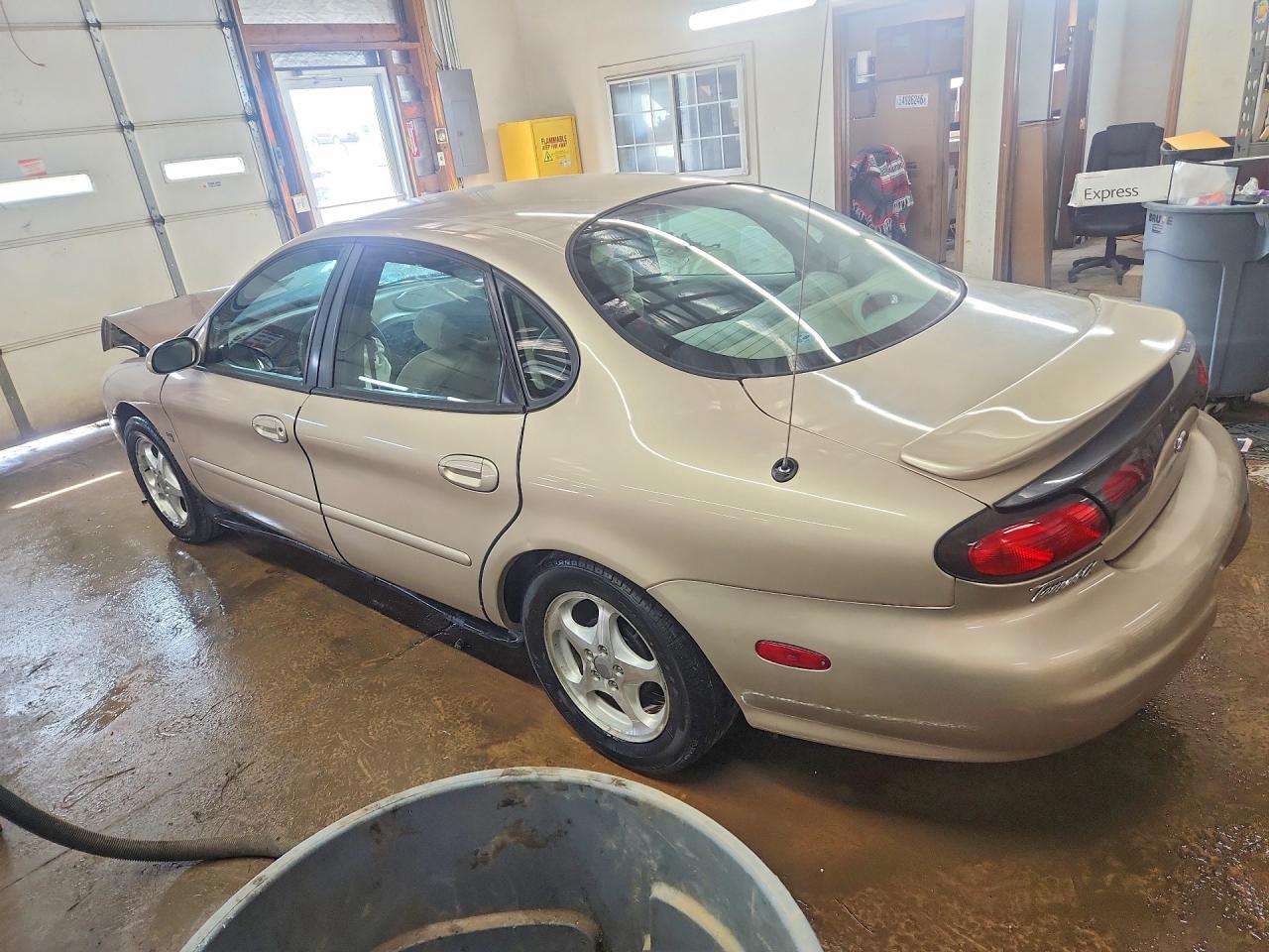 1999 Ford Taurus Se Tan vin: 1FAFP53S3XG214293