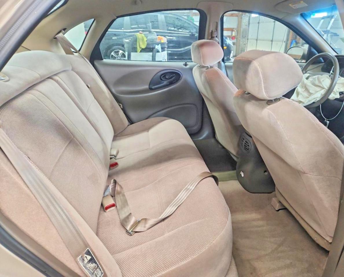 1999 Ford Taurus Se Tan vin: 1FAFP53S3XG214293