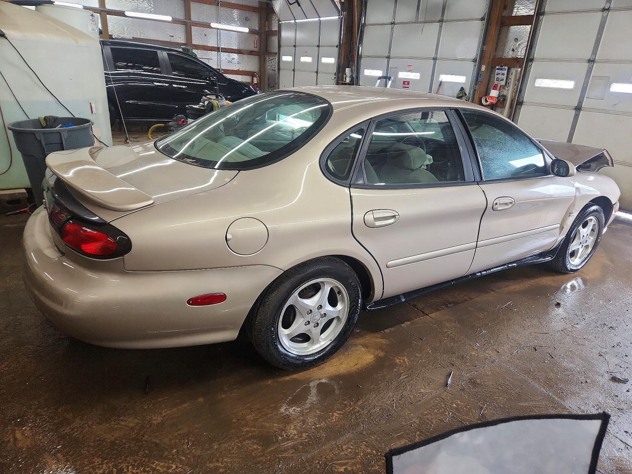 1999 Ford Taurus Se Tan vin: 1FAFP53S3XG214293