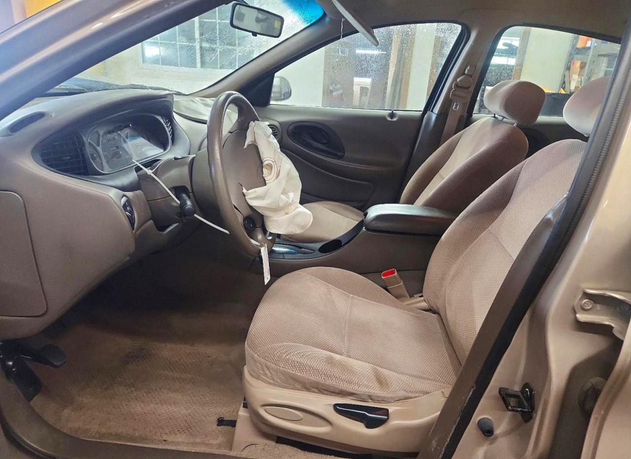 1999 Ford Taurus Se Tan vin: 1FAFP53S3XG214293