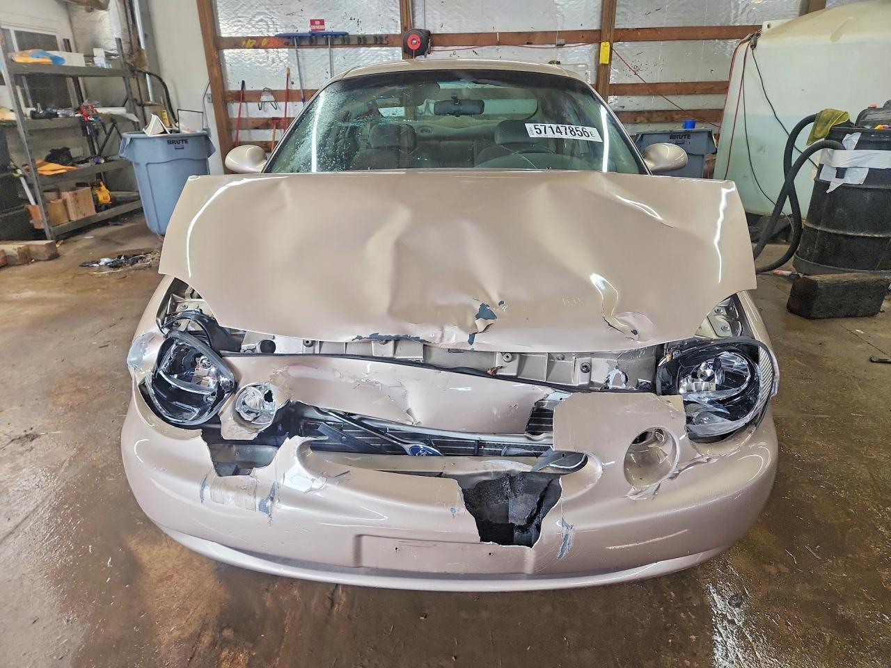 1999 Ford Taurus Se Tan vin: 1FAFP53S3XG214293