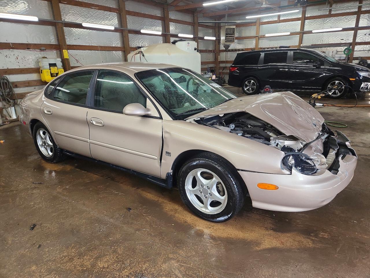 1999 Ford Taurus Se Tan vin: 1FAFP53S3XG214293
