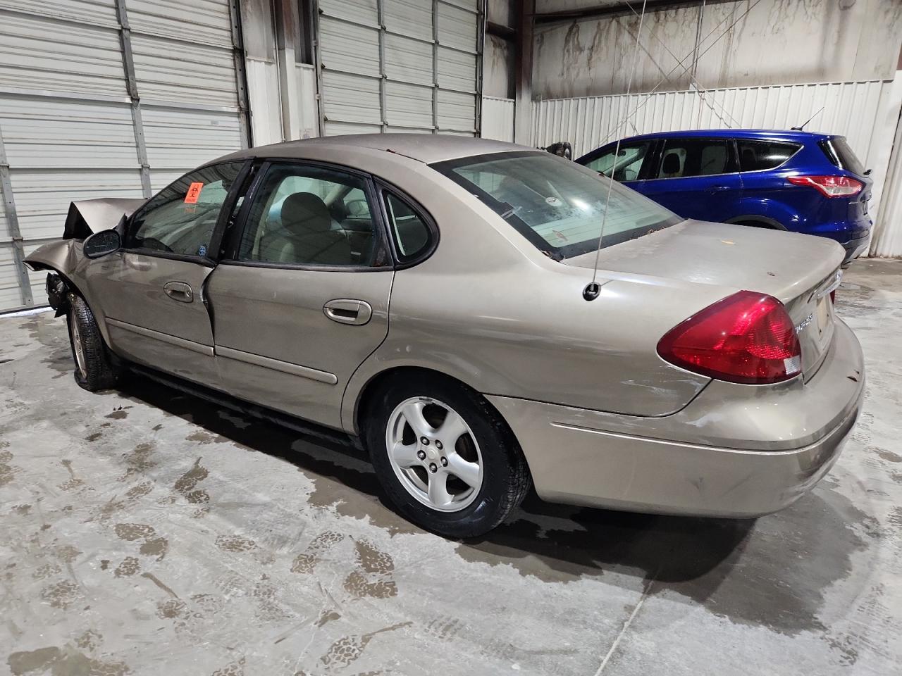 2002 Ford Taurus Se Tan vin: 1FAFP53U22G200122