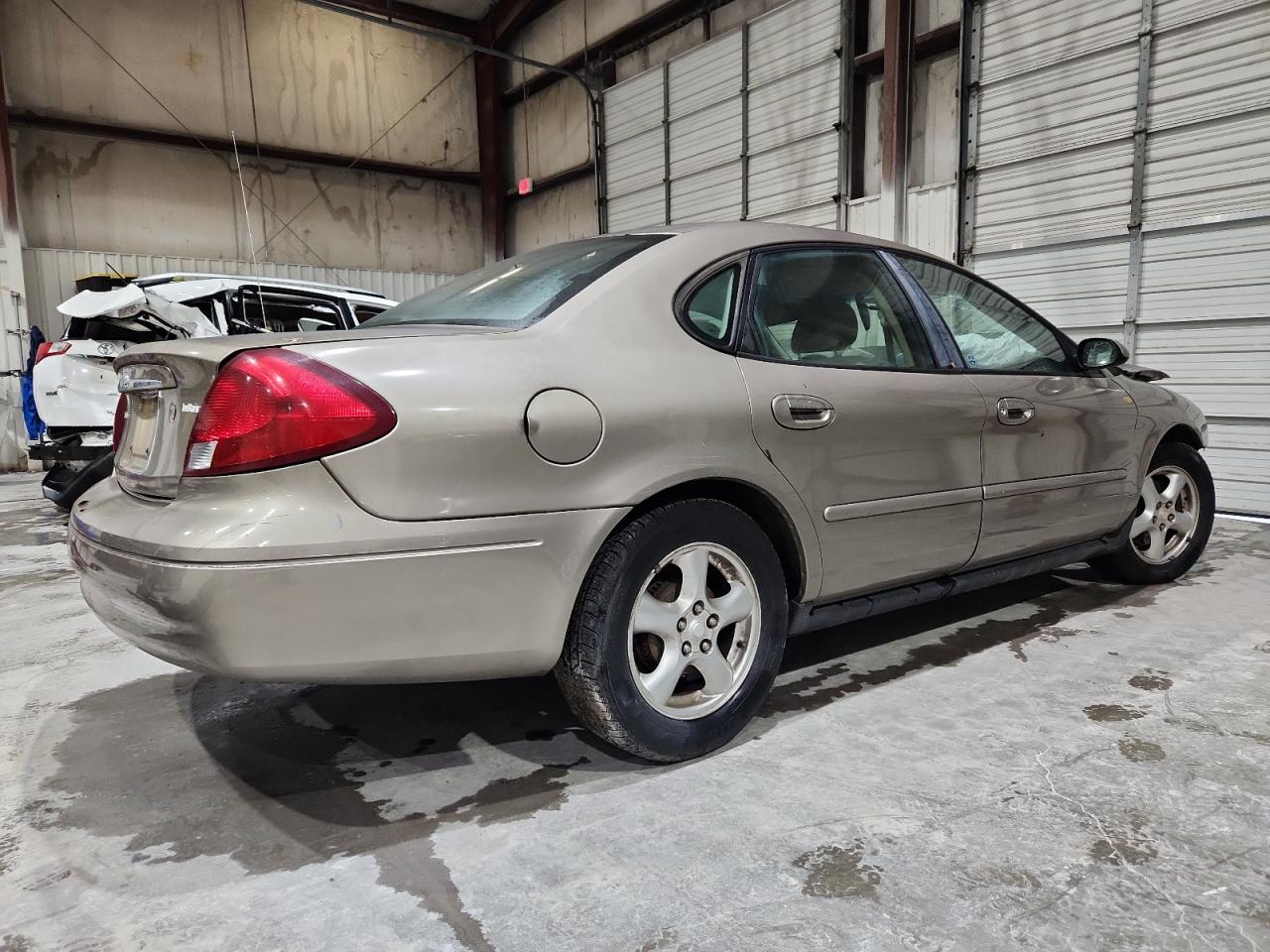 2002 Ford Taurus Se Tan vin: 1FAFP53U22G200122