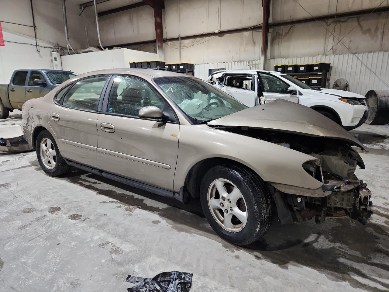 2002 Ford Taurus Se Tan vin: 1FAFP53U22G200122