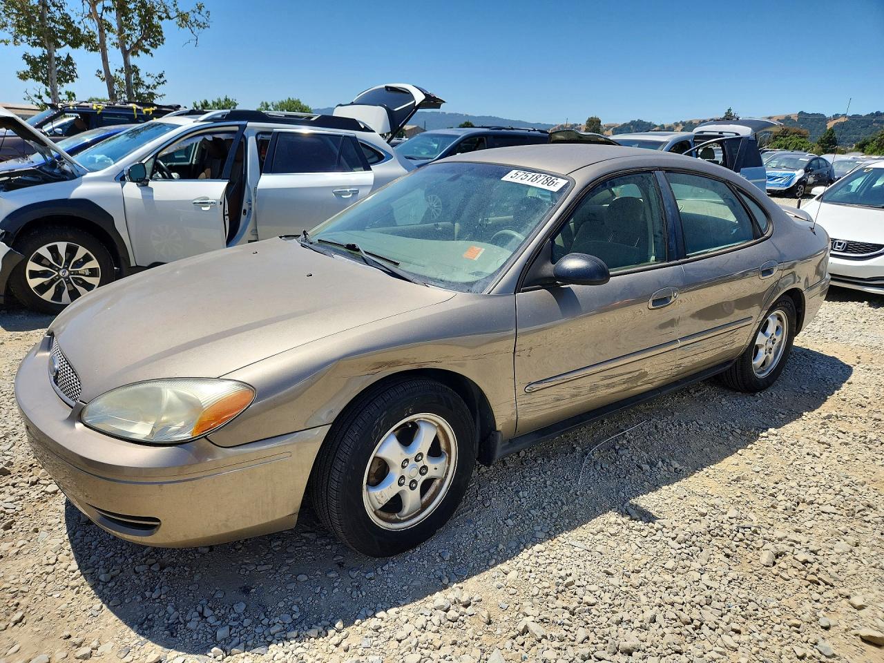 2006 Ford Taurus Se Tan vin: 1FAFP53U56A202777