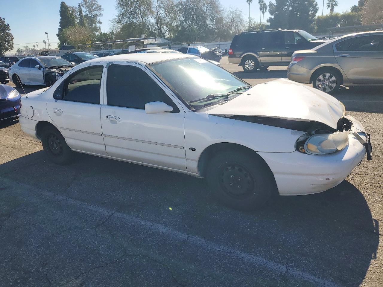 1999 Ford Contour Lx White vin: 1FAFP6531XK182565