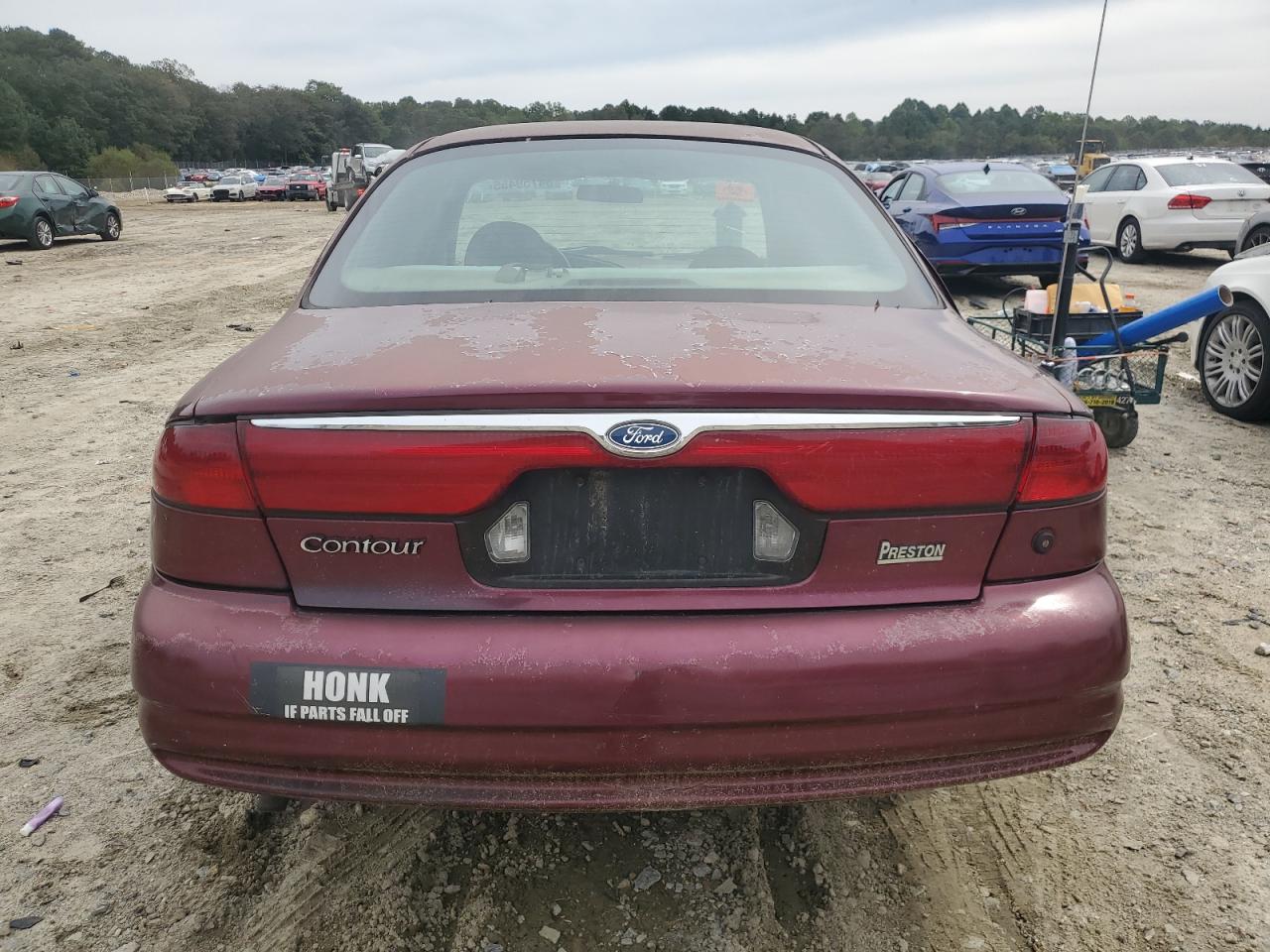 1999 Ford Contour Lx Burgundy vin: 1FAFP653XXK106939