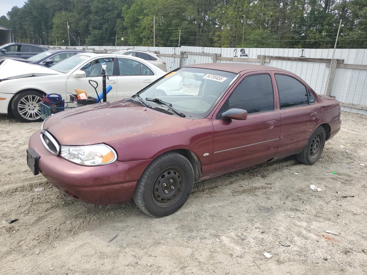 1999 Ford Contour Lx Burgundy vin: 1FAFP653XXK106939