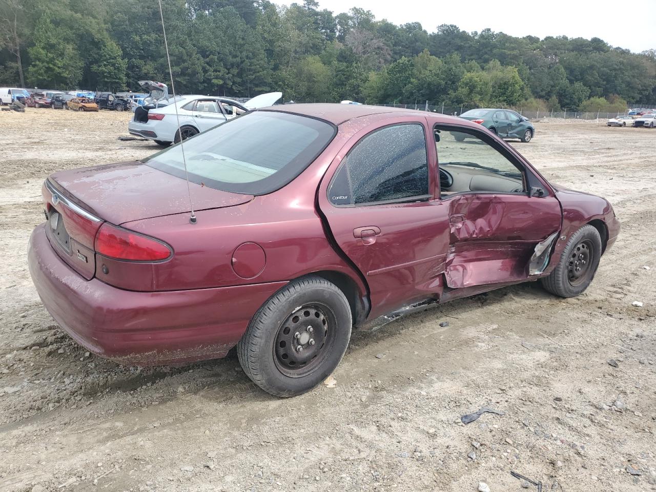 1999 Ford Contour Lx Burgundy vin: 1FAFP653XXK106939