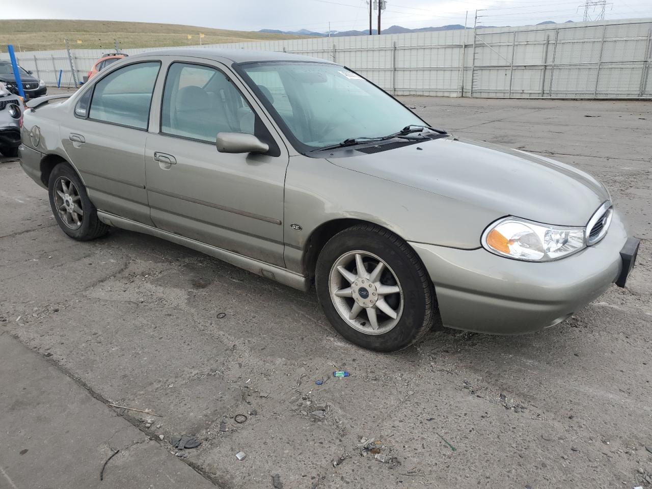 1999 Ford Contour Se Tan vin: 1FAFP66L5XK215968