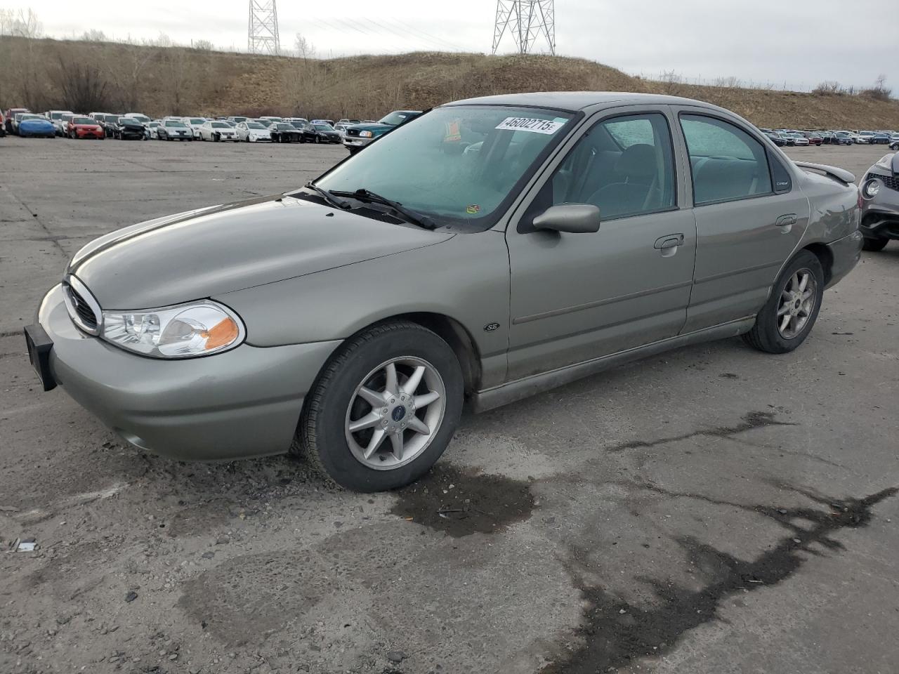1999 Ford Contour Se Tan vin: 1FAFP66L5XK215968