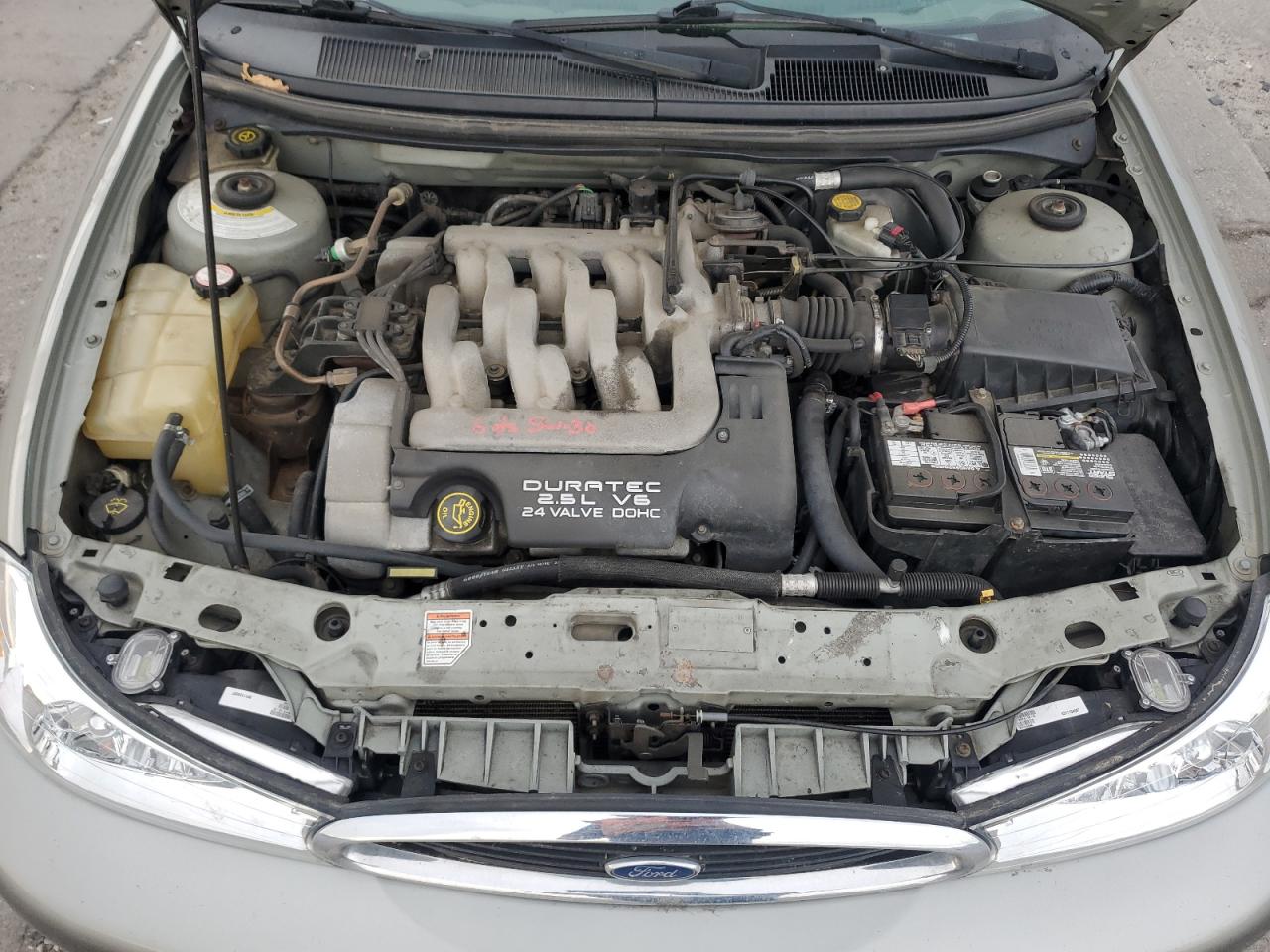 1999 Ford Contour Se Tan vin: 1FAFP66L5XK215968