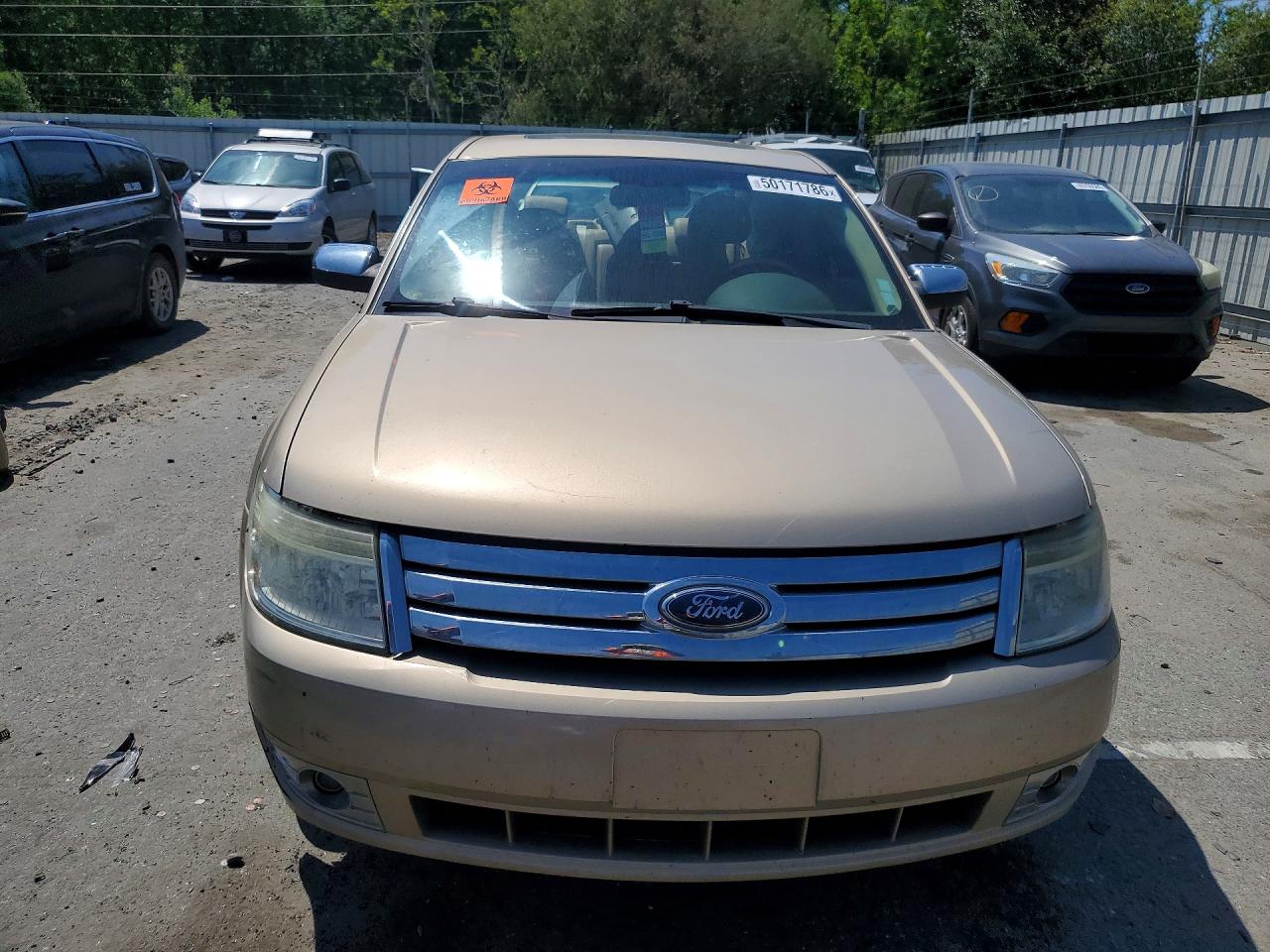 2008 Ford Taurus Limited Gold vin: 1FAHP25W58G128265