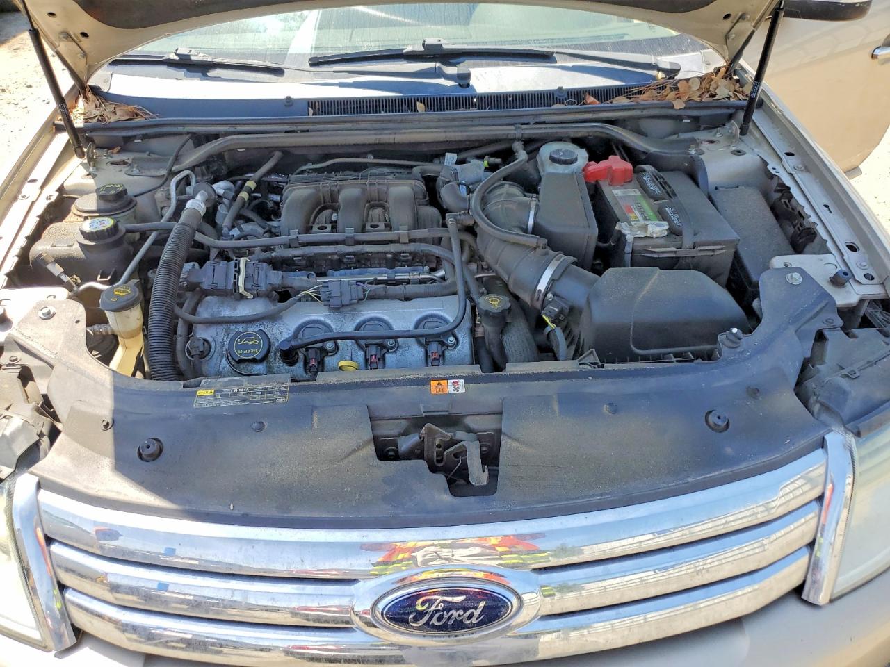 2008 Ford Taurus Limited Gold vin: 1FAHP25W58G128265