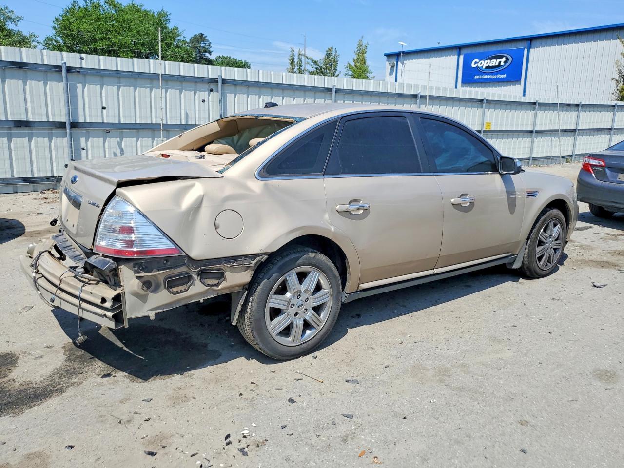 2008 Ford Taurus Limited Gold vin: 1FAHP25W58G128265