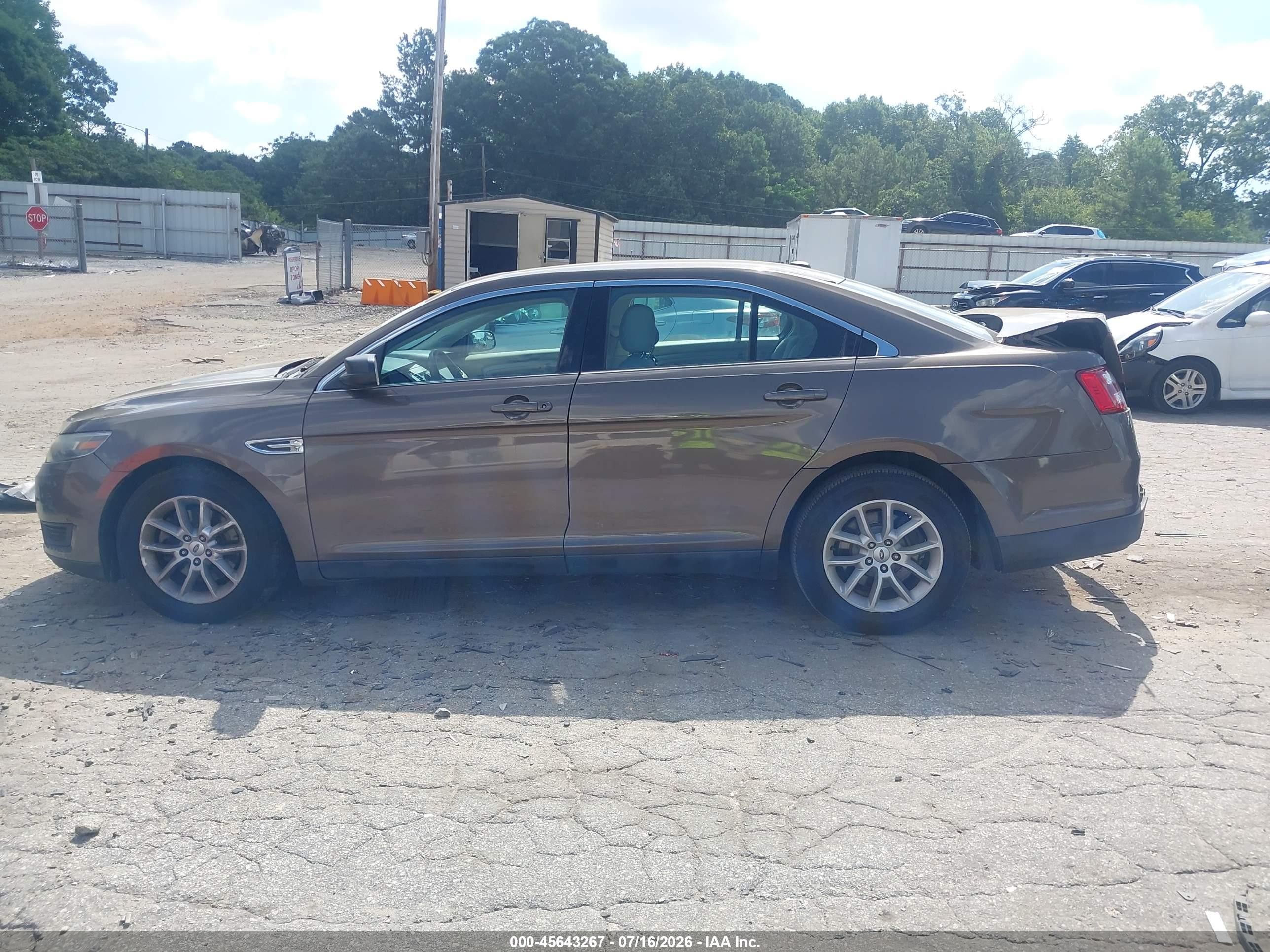 2015 Ford Taurus Se Tan vin: 1FAHP2D89FG126342