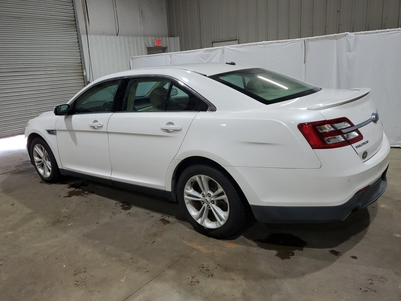 2015 Ford Taurus Sel White vin: 1FAHP2E89FG100533 Damage: Left Qtr Panel, Heavy Scratch, 1/2 To 1 Inch