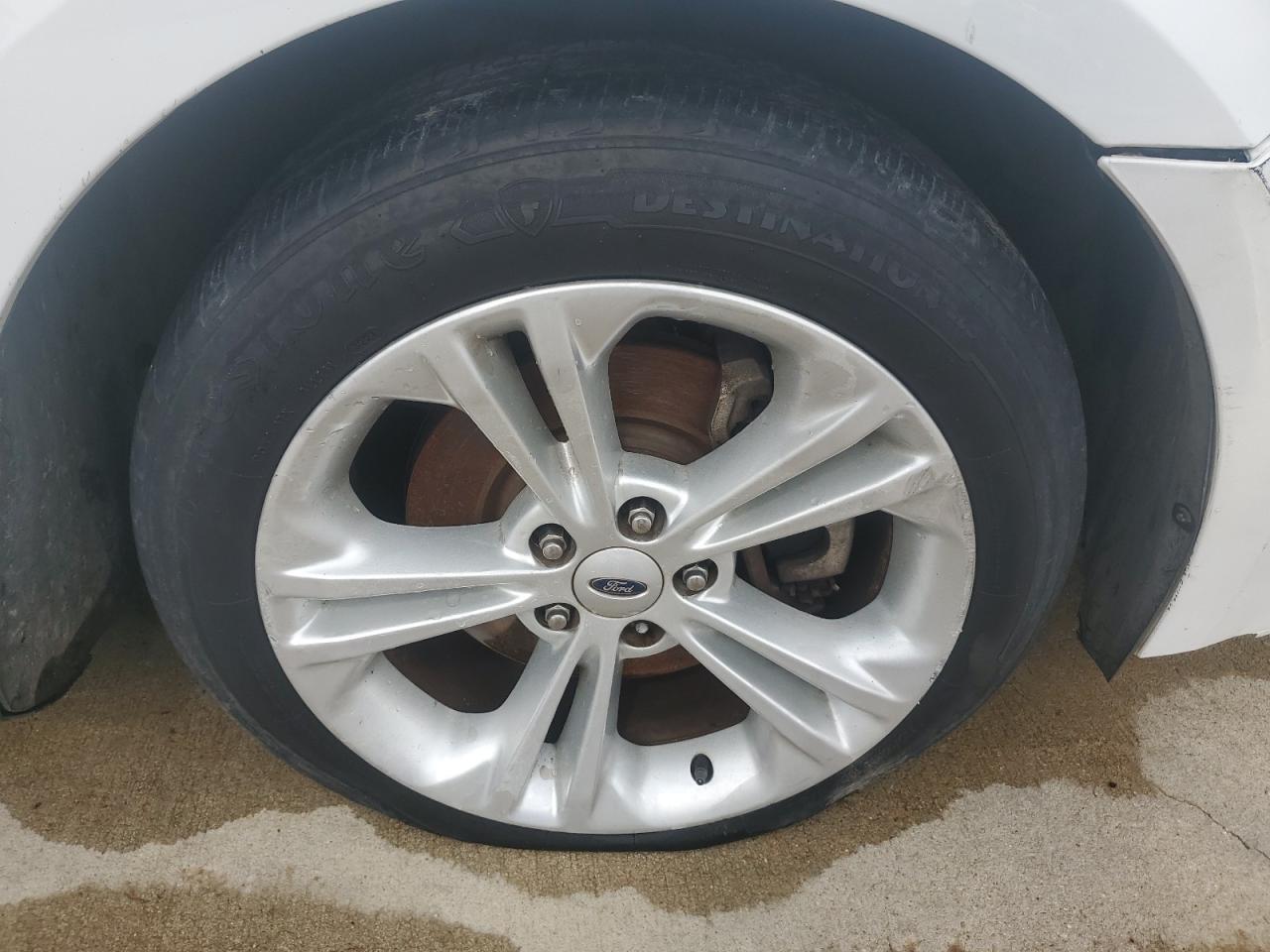 2015 Ford Taurus Sel White vin: 1FAHP2E95FG154615 Damage: Right Front Wheel, Curb Rash, 7 To 8 Inches