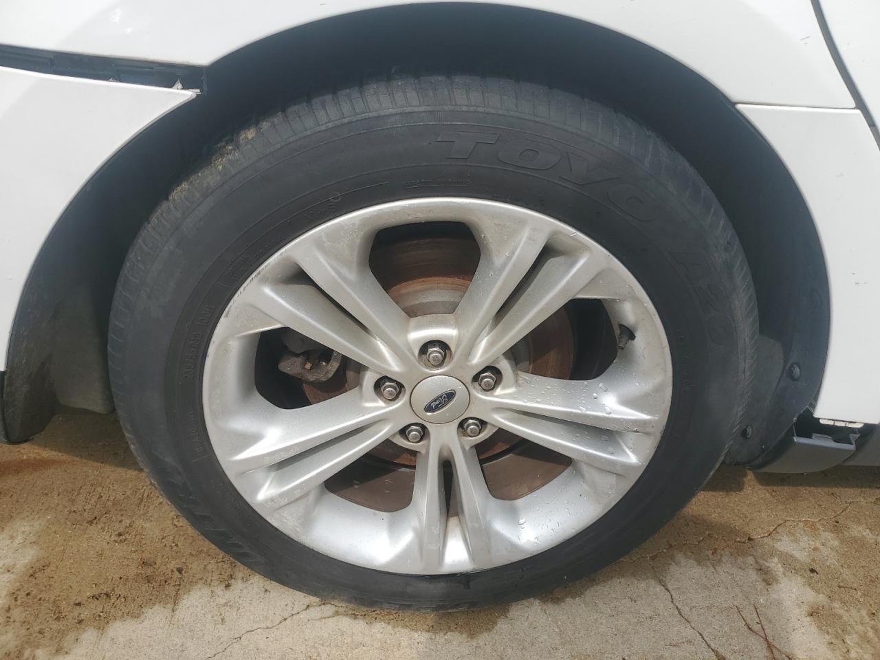 2015 Ford Taurus Sel White vin: 1FAHP2E95FG154615 Damage: Rear Bumper Cover Upper, Broken, Replacement Required