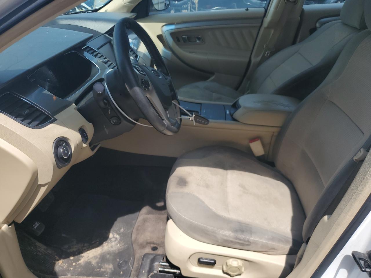 2015 Ford Taurus Sel White vin: 1FAHP2E95FG154615 Damage: Left Front Seat, Stained, Permanent