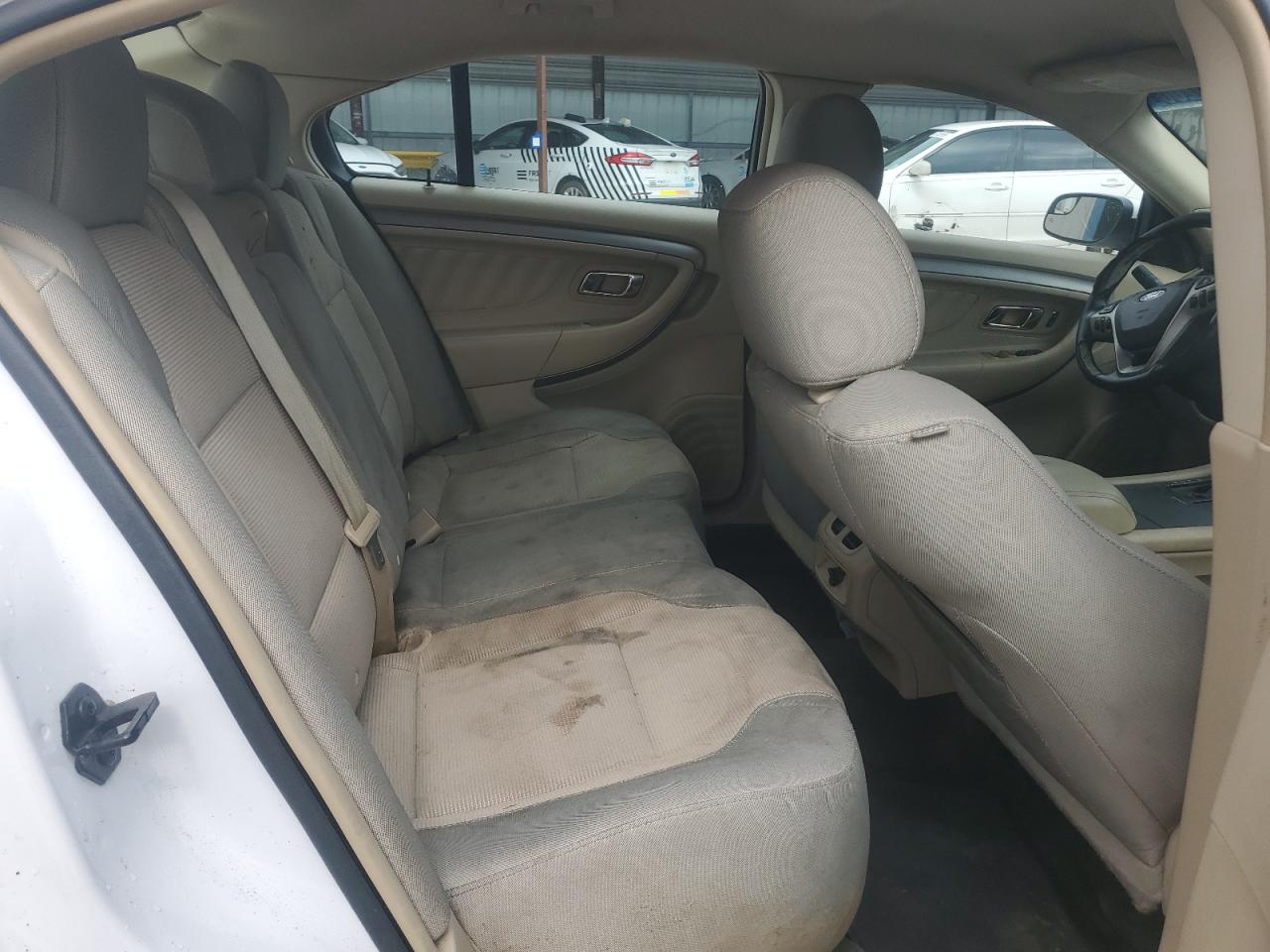 2015 Ford Taurus Sel White vin: 1FAHP2E95FG154615 Damage: Left Rear Seat, Stained, Permanent