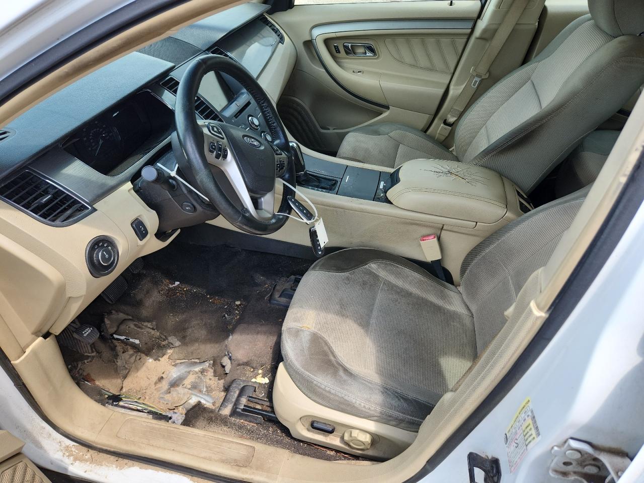 2015 Ford Taurus Sel White vin: 1FAHP2E96FG137970 Damage: Left Front Carpet, Worn, Replacement Required