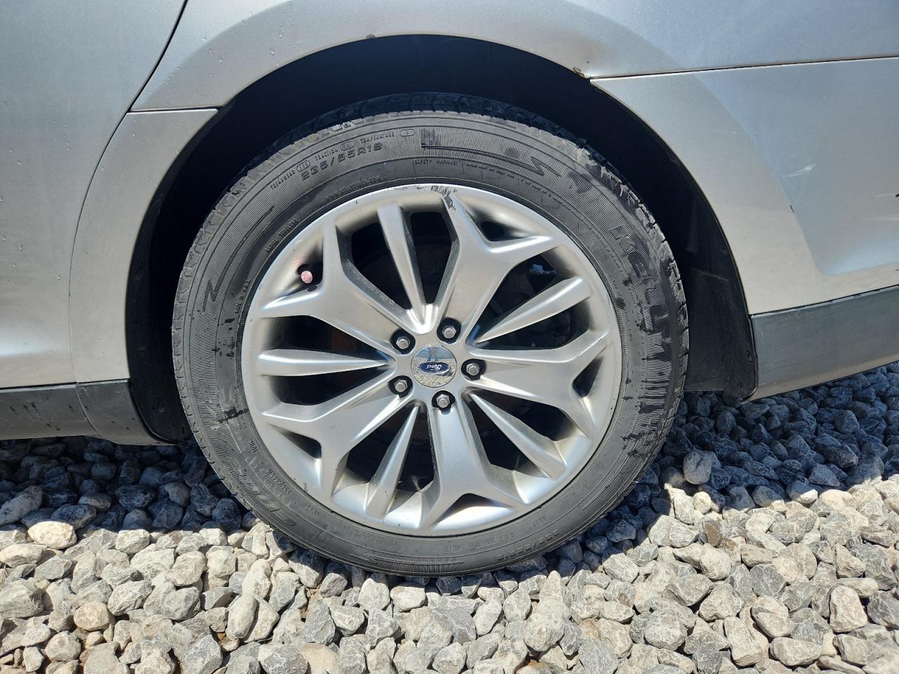 2013 Ford Taurus Silver vin: 1FAHP2F80DG200645 Damage: Left Rear Wheel, Curb Rash, 3 To 4 Inches