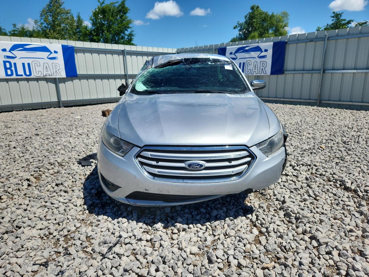 2013 Ford Taurus Silver vin: 1FAHP2F80DG200645 Damage: Left Head Lamp, Faded, Repair Required