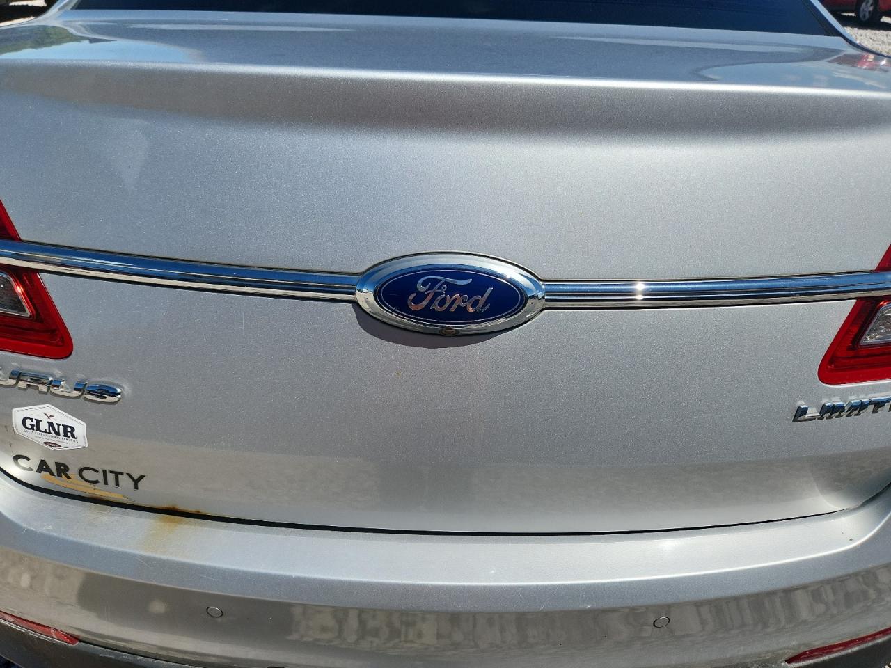 2013 Ford Taurus Silver vin: 1FAHP2F80DG200645 Damage: Deck Lid, Rust, 5 To 6 Inches