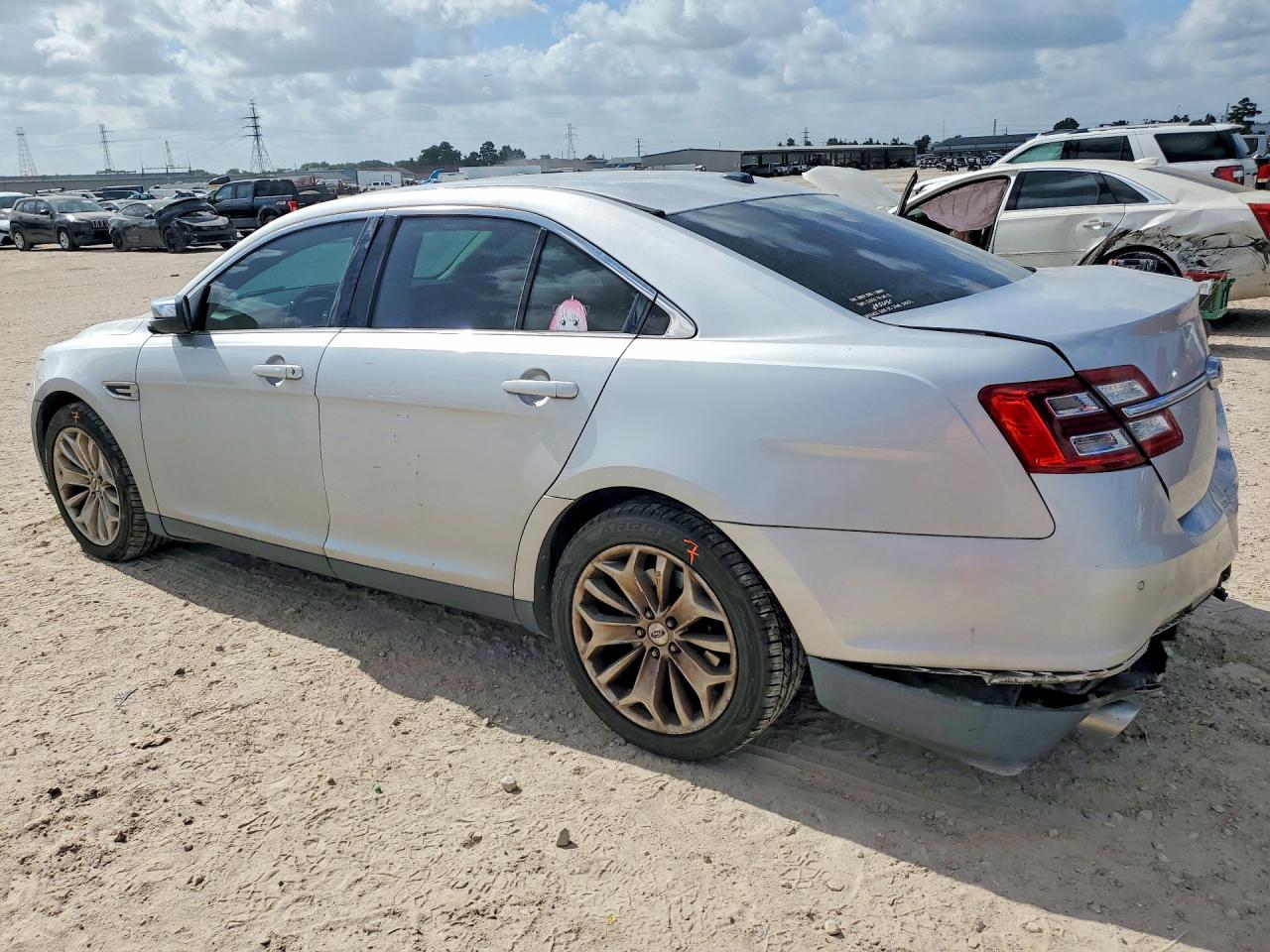 2015 Ford Taurus Limited Серебряный vin: 1FAHP2F82FG110870