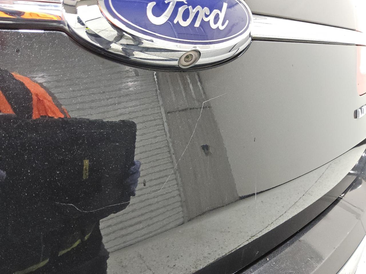 2014 Ford Taurus Limited Черный vin: 1FAHP2F86EG179303 Damage: Deck Lid, Heavy Scratch, > 12 Inches