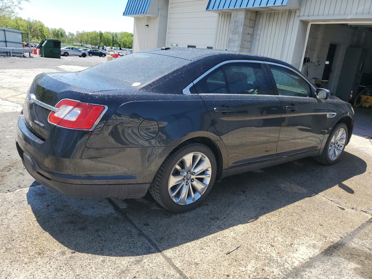 2011 Ford Taurus Limited Black vin: 1FAHP2FW1BG140385 Damage: Right Rear Door, Dent(S) W/ Paint Dmg, 1 To 2 Inches