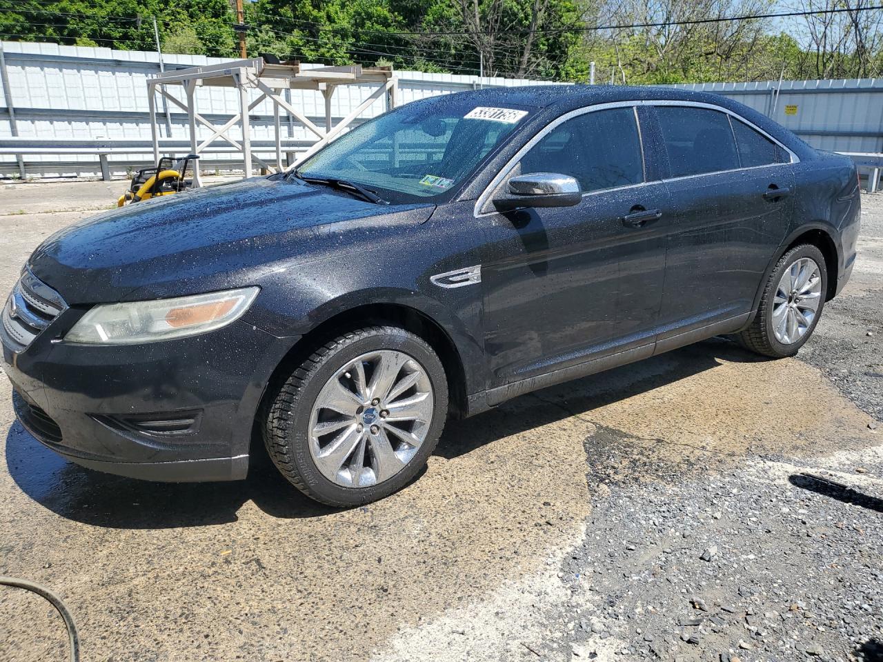 2011 Ford Taurus Limited Black vin: 1FAHP2FW1BG140385 Damage: Left Front Door, Multiple Scratches Heavy, 2
