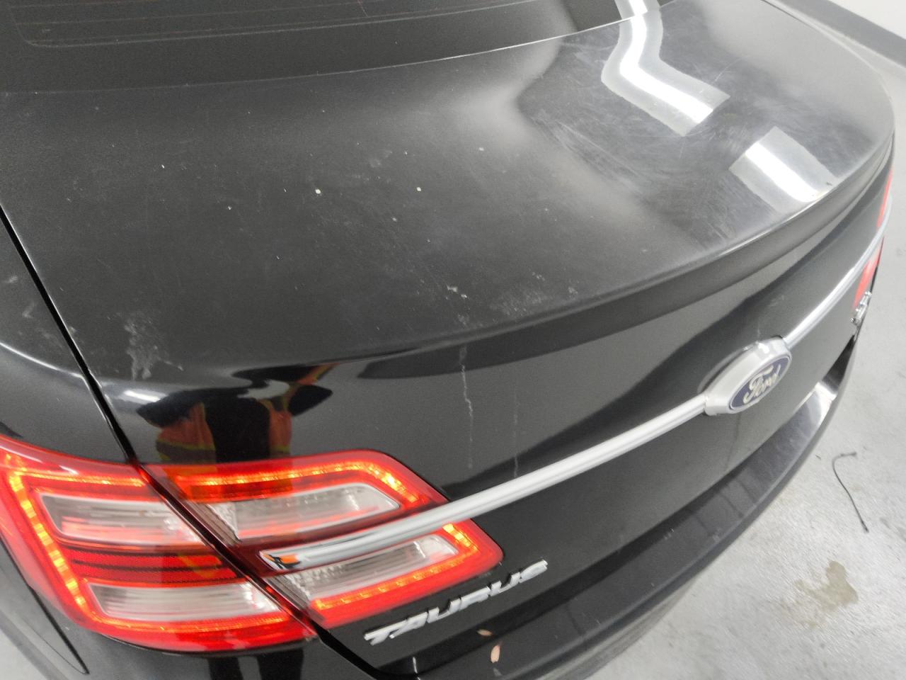 2017 Ford Taurus Sel Black vin: 1FAHP2H82HG126292 Damage: Deck Lid, Heavy Scratch, 1/2 To 1 Inch